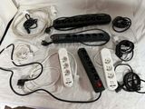 a lot of cords that are connected to a power strip