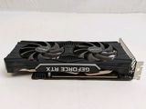 a close up of a video card on a white surface