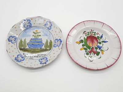 two plates that are sitting on a table