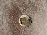a piece of wood that has a hole in it