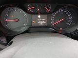 a car dashboard with various gauges and numbers on it