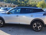 2020 nissan c - hr is parked in a parking lot with other cars in the background