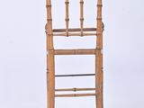 a wooden chair that has a wooden seat on it