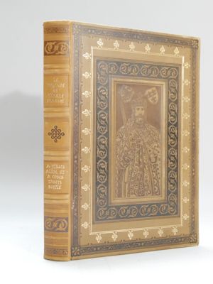 an old book with a picture of a woman in a gold dress