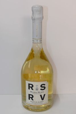 a bottle of wine that is sitting on a table