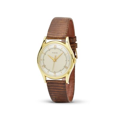 une image d'une montre en or avec un bracelet en cuir marron