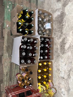 several boxes of beer are stacked on top of each other