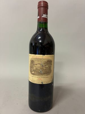 a bottle of wine that is sitting on a table