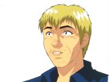 an image of a man with blonde hair and a blue shirt
