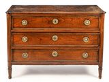 a wooden chest of drawers with brass knobs on it