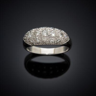 a diamond and white gold ring, by van cleef