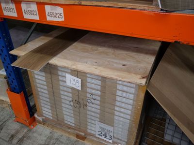 a box on a shelf in a store with a price tag