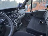 a view of the inside of a vehicle from the driver ' s seat