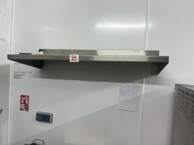 an image of a stainless steel shelf in a kitchen