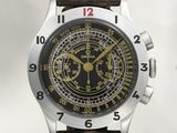 a close up of a watch on a white background