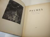 an open book with a black and white image of palmes on it