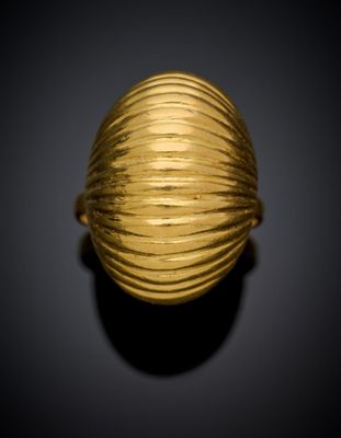 an image of a gold ring on a black background