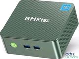 a close up of a green box with a blue button on it