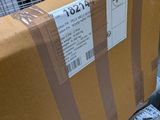 a box on the back of a truck with a price tag on it