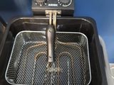 a fryer that is sitting on top of a counter