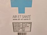a white box with a blue cross on it