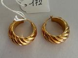 pair of gold toned hoop earrings on white background with price tag