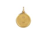 a close up of a gold coin with a cross on it