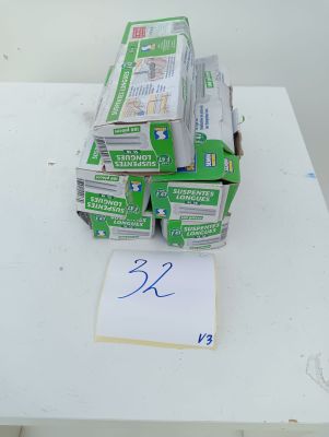 a stack of newspapers sitting on top of a white table