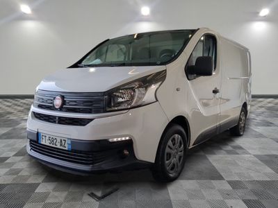 a picture of a white van parked in a room