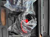 a black case with a red handle and a black case with a red handle and a black case with a red handle and a black case with a red
