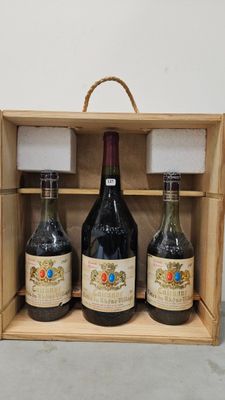 three bottles of wine in a wooden box