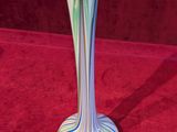 a vase that is sitting on a red table
