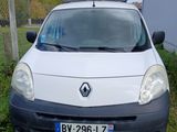 a white van that is parked in the grass