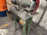 a machine that is sitting on a table in a garage