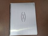 a picture of a notebook with a picture of a logo on it