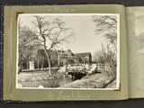 a black and white photo of an old photo of a house
