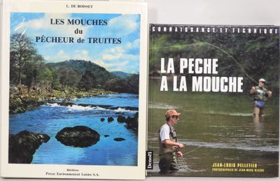 two books on a table with a man fly fishing in the river