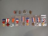 a lot of medals and medals in a display case