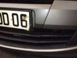 a close up of a number plate on the front of a car