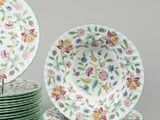 a lot of plates that are sitting on top of each other