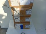a stack of boxes sitting on top of a white table