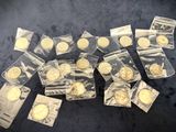 a pile of gold coins sitting on top of a table