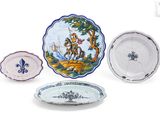 several plates with different designs and designs on them on a white surface