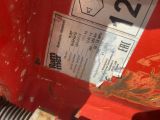 a close up of a red fire hydrant with a number on it