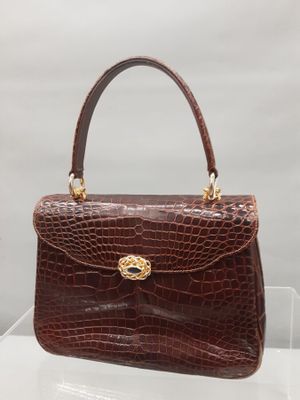 OLOP. Sac à main en cuir façon crocodile avec boucle en chaî…