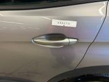 a sticker on the door handle of a car