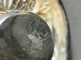 a close up of a metal object on a table