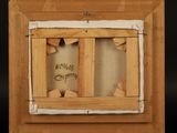 an old picture of a wooden frame with a piece of paper in it