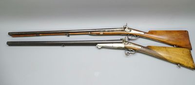 three different types of shotguns on a white surface