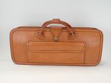 brown leather suitcase with handle and strap on white background